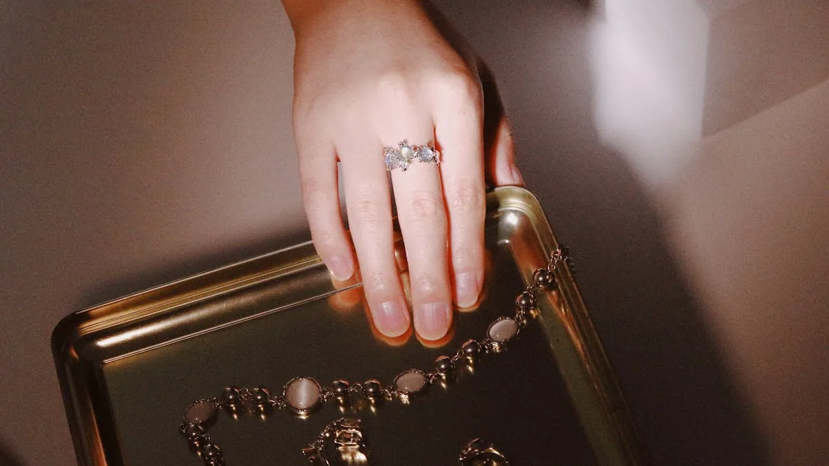 A hand wearing a ring - a year-later anniversary check-in SMS is one of the highest-ROI messages a jeweler can send.